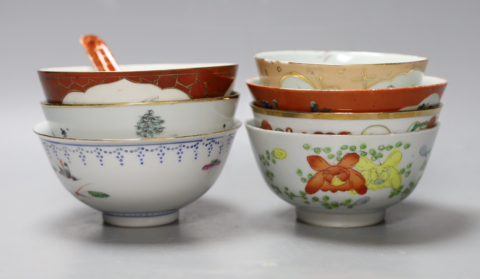 A selection of seven Chinese Republic period bowls, together with a rice spoon. Largest bowl 13cm diameter